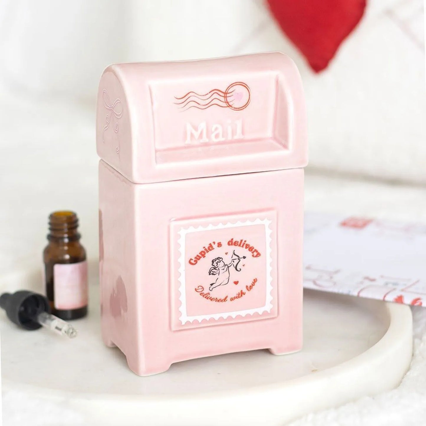 Boîte aux lettres rose